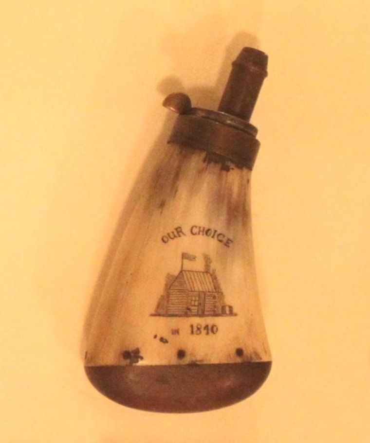 A gunpowder flask carries a political message.